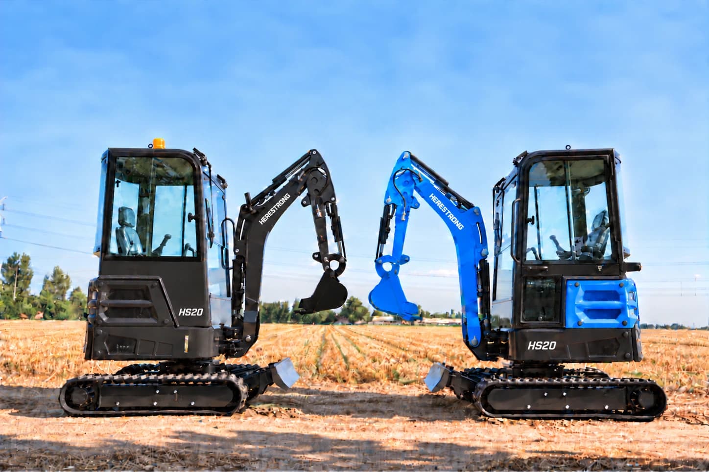 Two HERESTRONG HS20 excavators in customer-specified black and blue finishes